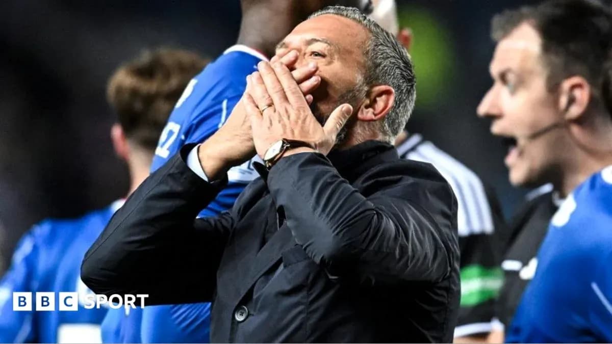 Coach reacting passionately during a match