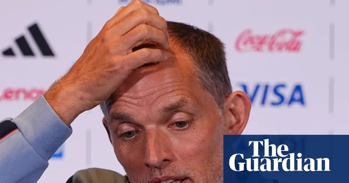 Coach speaking at press conference with media