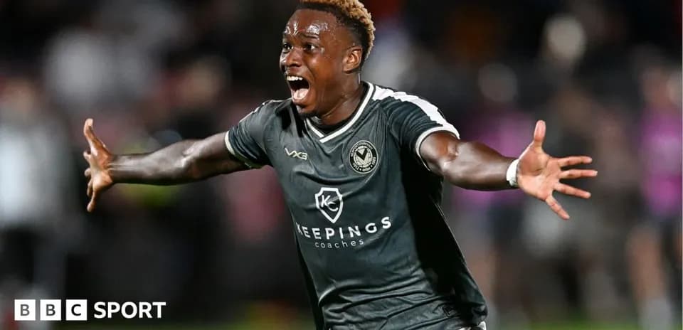 Player celebrating passionately after scoring a goal