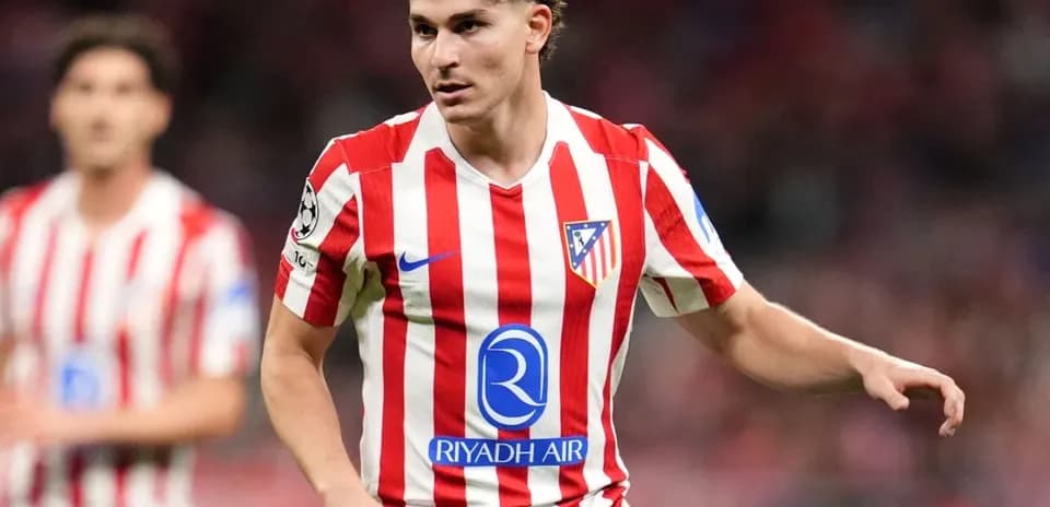 Atletico Madrid player in red and white jersey
