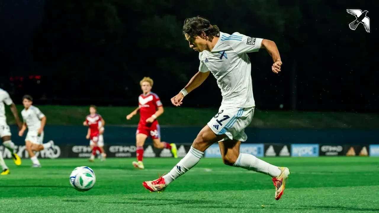 Player kicking the ball during MLS Next Pro match