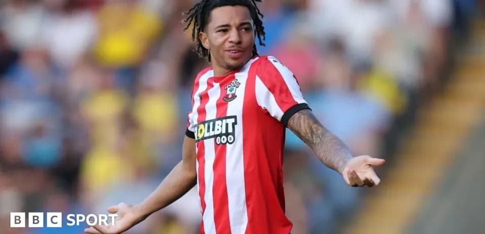 Player gesturing during a football match on field