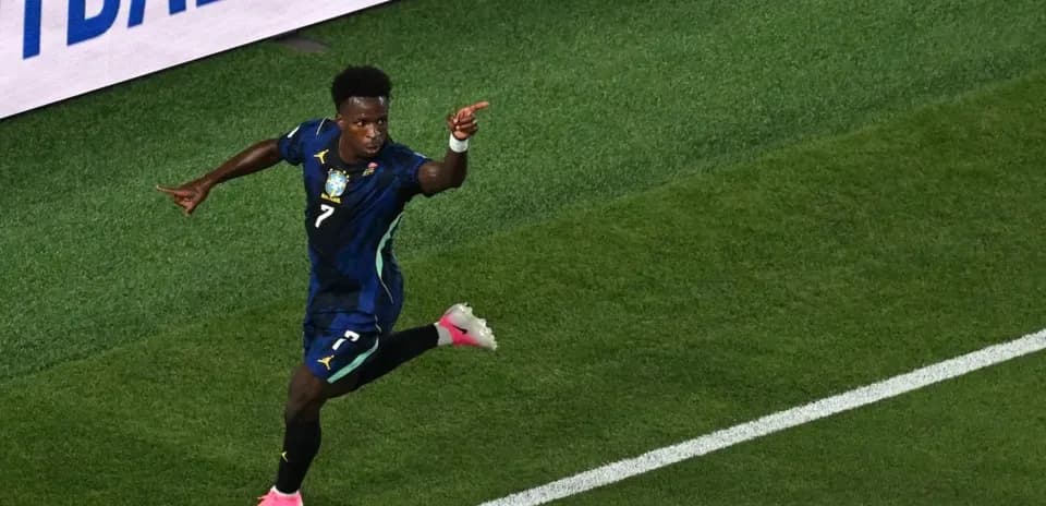Player celebrating a goal on the pitch