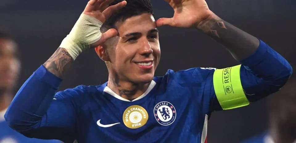 Chelsea player celebrating during match with fans
