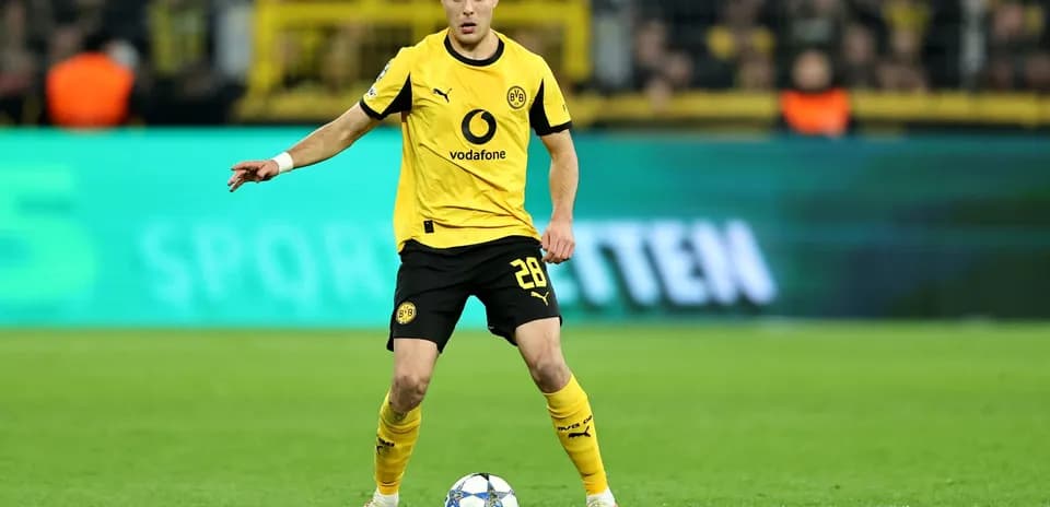 Player controlling ball during UEFA Champions League match