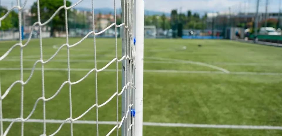 Close-up of a soccer goal on a field