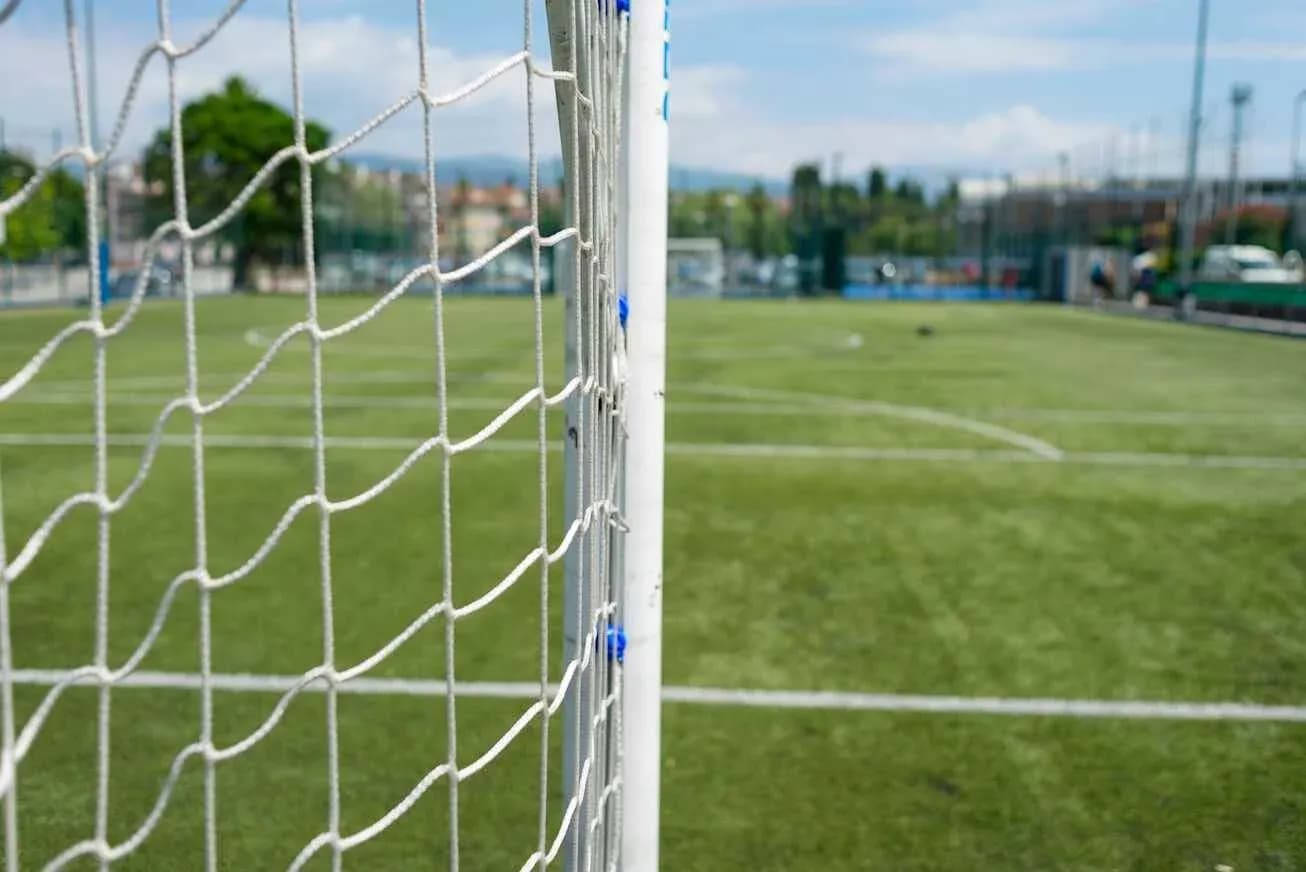 Close-up of a soccer goal on a field