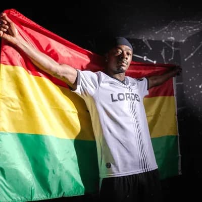 Player holding a flag during promotional photo shoot