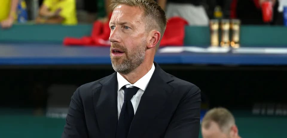 Coach observing the match from the sideline
