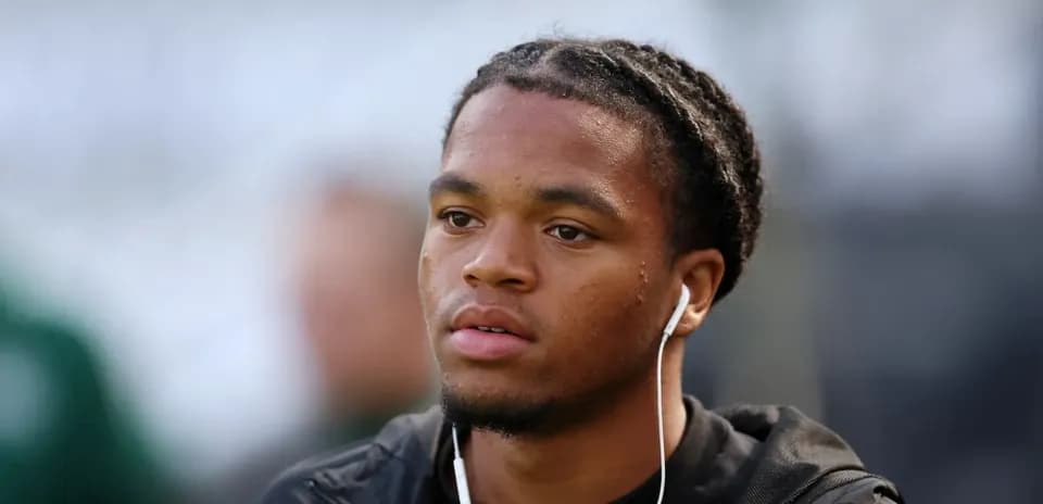Player wearing earphones before the match