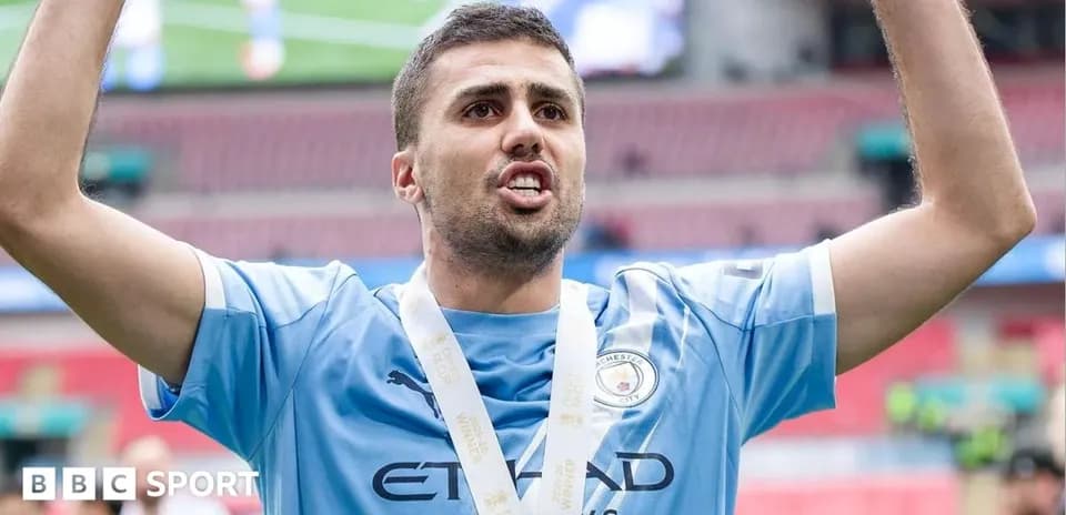 Player celebrating with medal after match victory