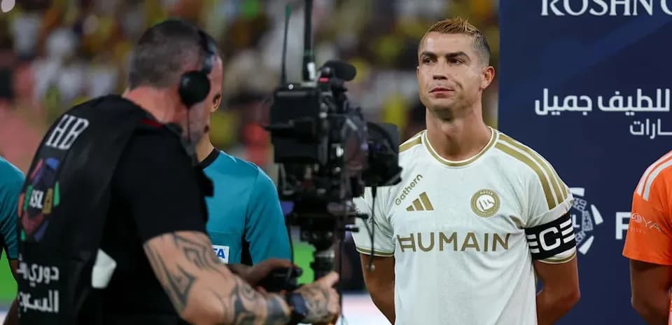 Cristiano Ronaldo standing before the match with teammates