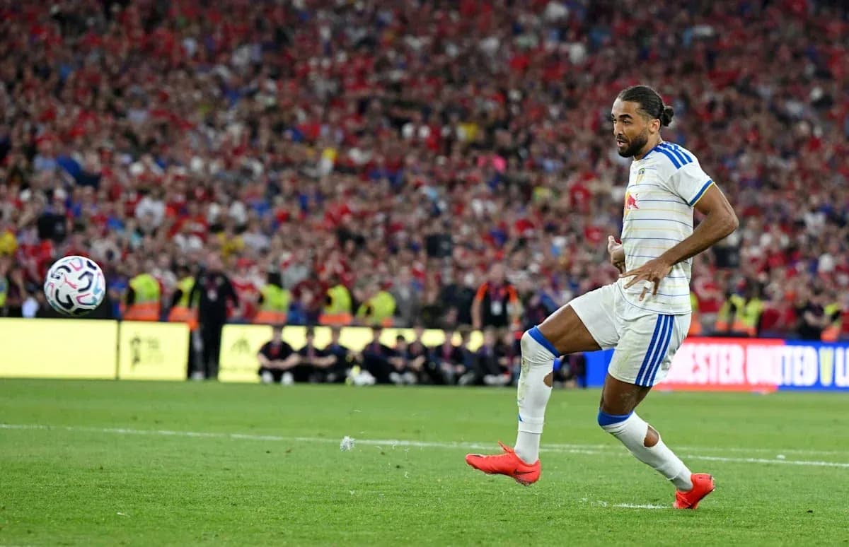 Player kicking ball during intense match moment