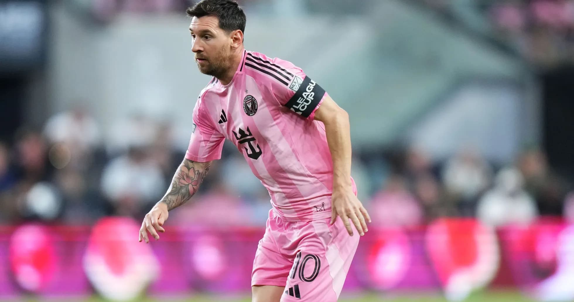 Lionel Messi playing in pink Inter Miami jersey