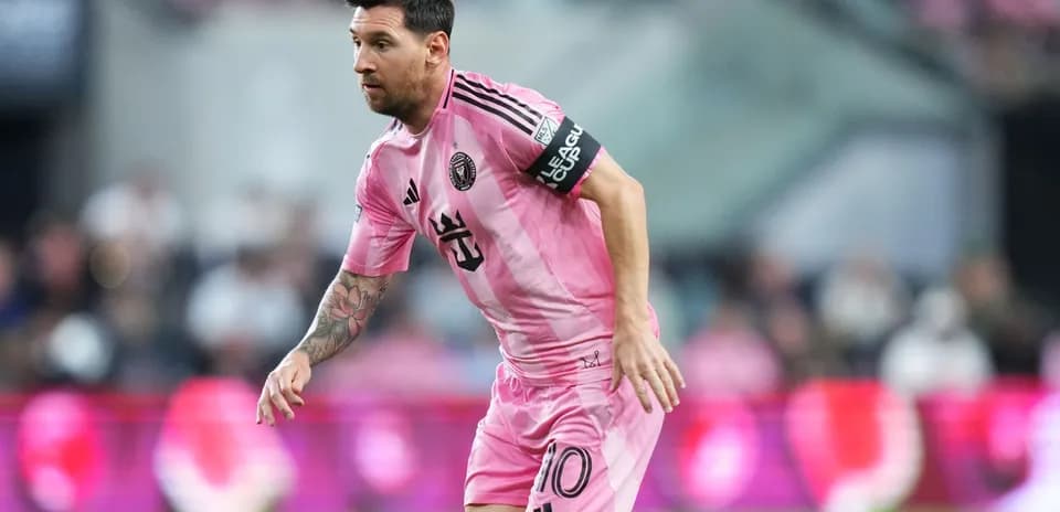 Lionel Messi playing in pink Inter Miami jersey