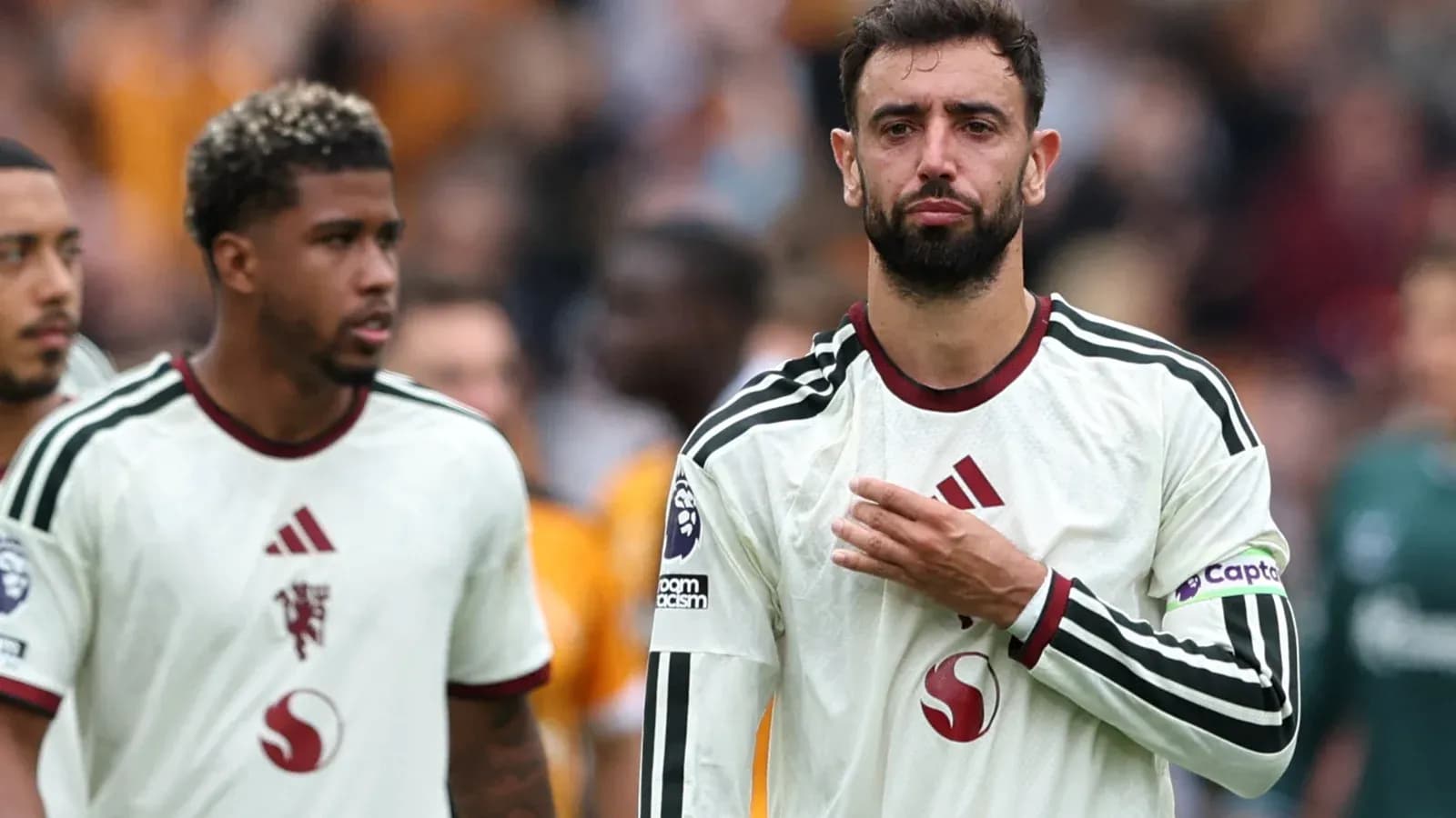 Players walking off the pitch after a match