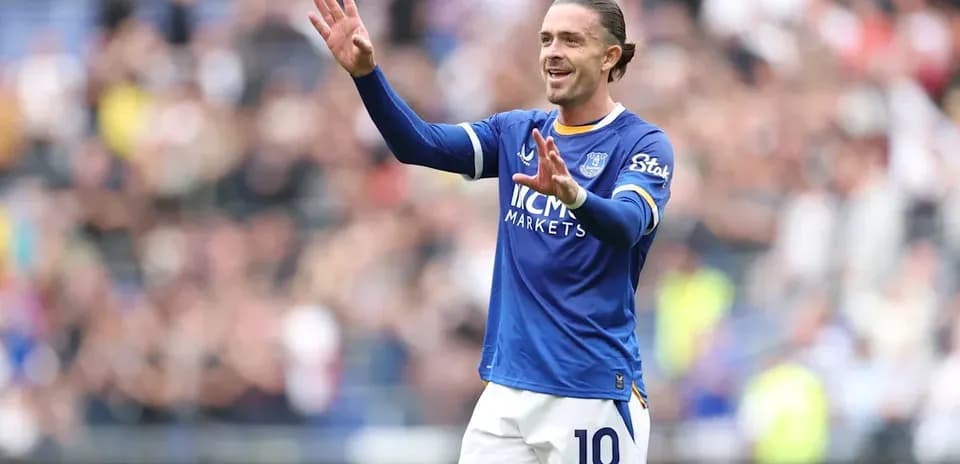 Player celebrating in blue jersey during match