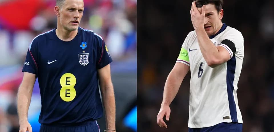 Two England football players on the pitch during match