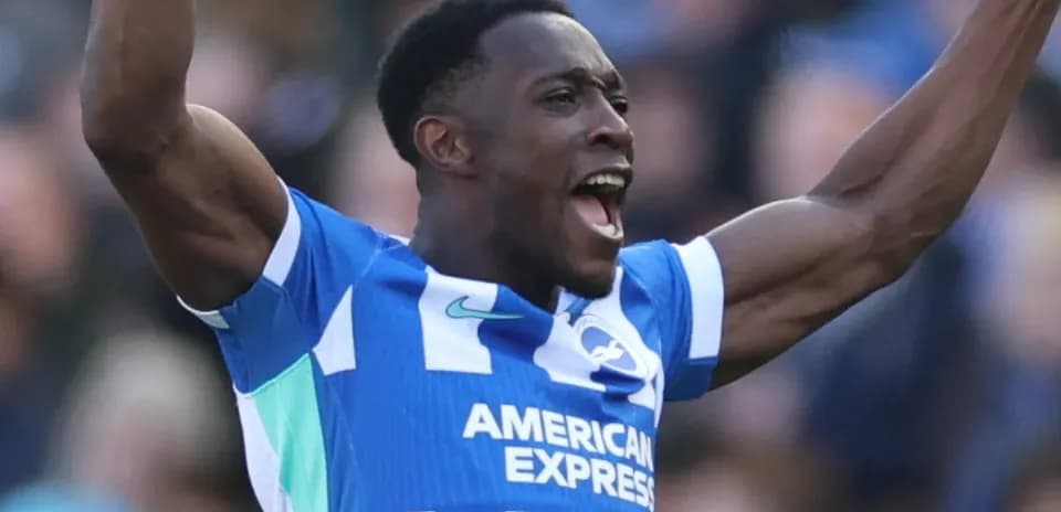 Player celebrating a goal in team jersey