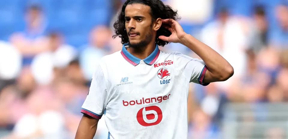 Player adjusting hair during a match