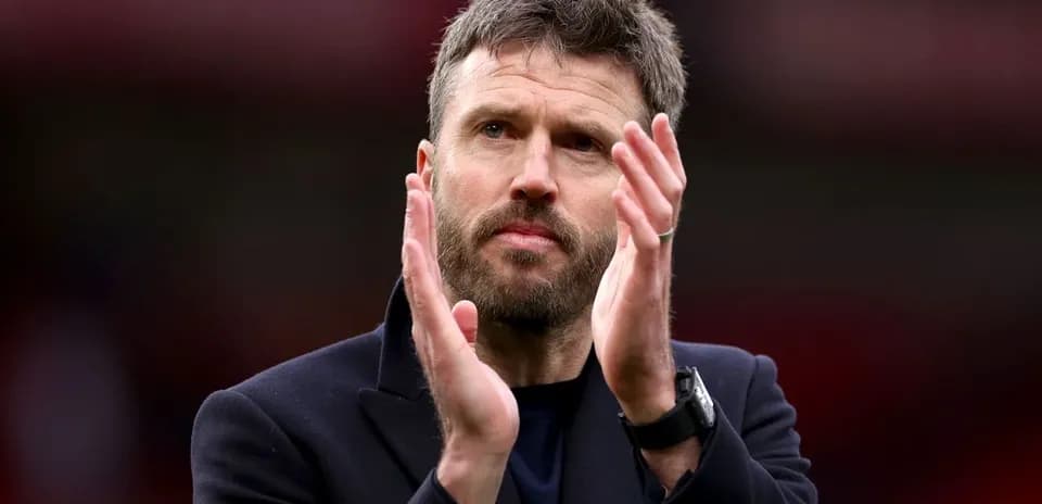 Man applauding in a sports venue