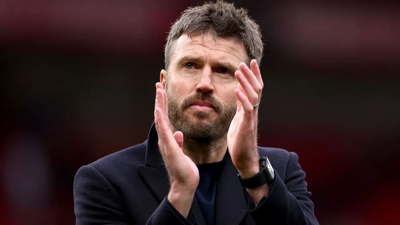 Man applauding in a sports venue