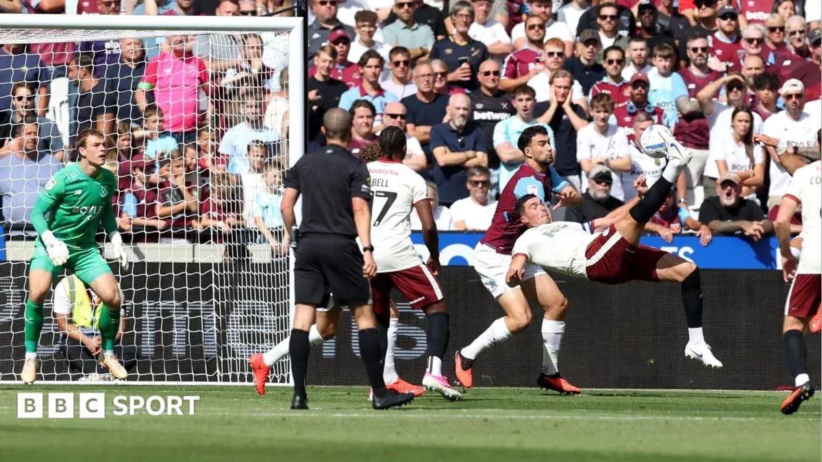 Player attempting bicycle kick in front of goal