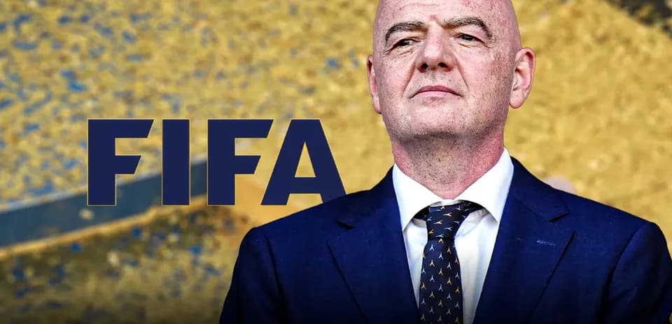 FIFA logo with official standing in background