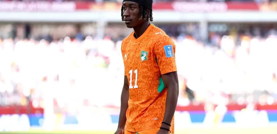 Player in orange jersey during a match