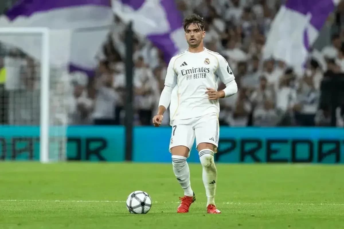 Player preparing to take a free kick during match