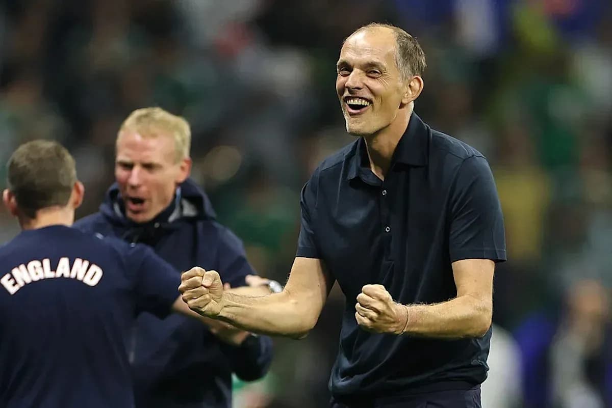 Coach celebrating with staff after match victory