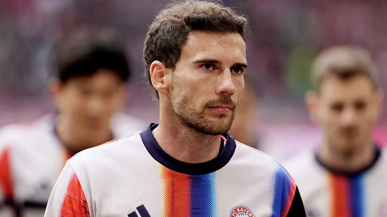 Player walking onto the pitch before the match