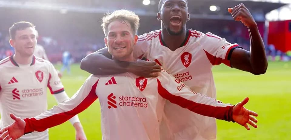 Liverpool players celebrating a goal during match