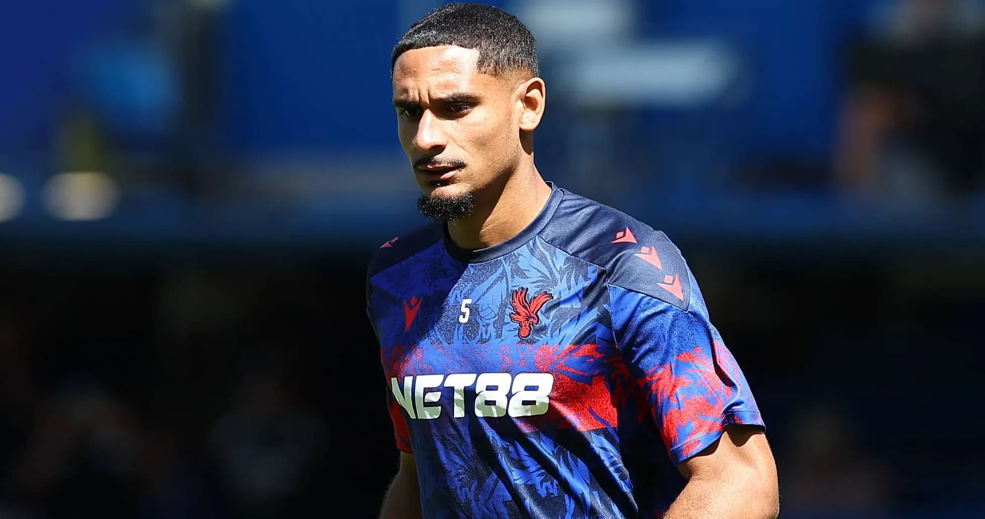 Player wearing Crystal Palace training kit on field