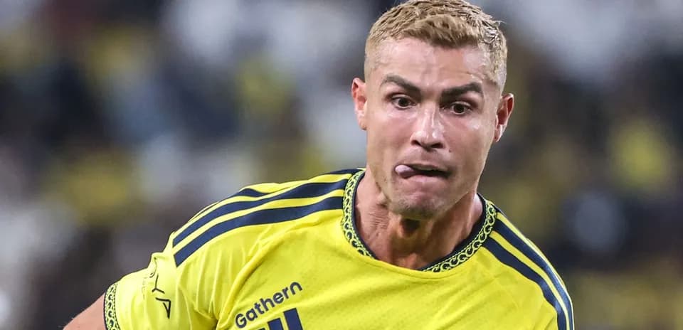 Player in yellow jersey sprinting during match