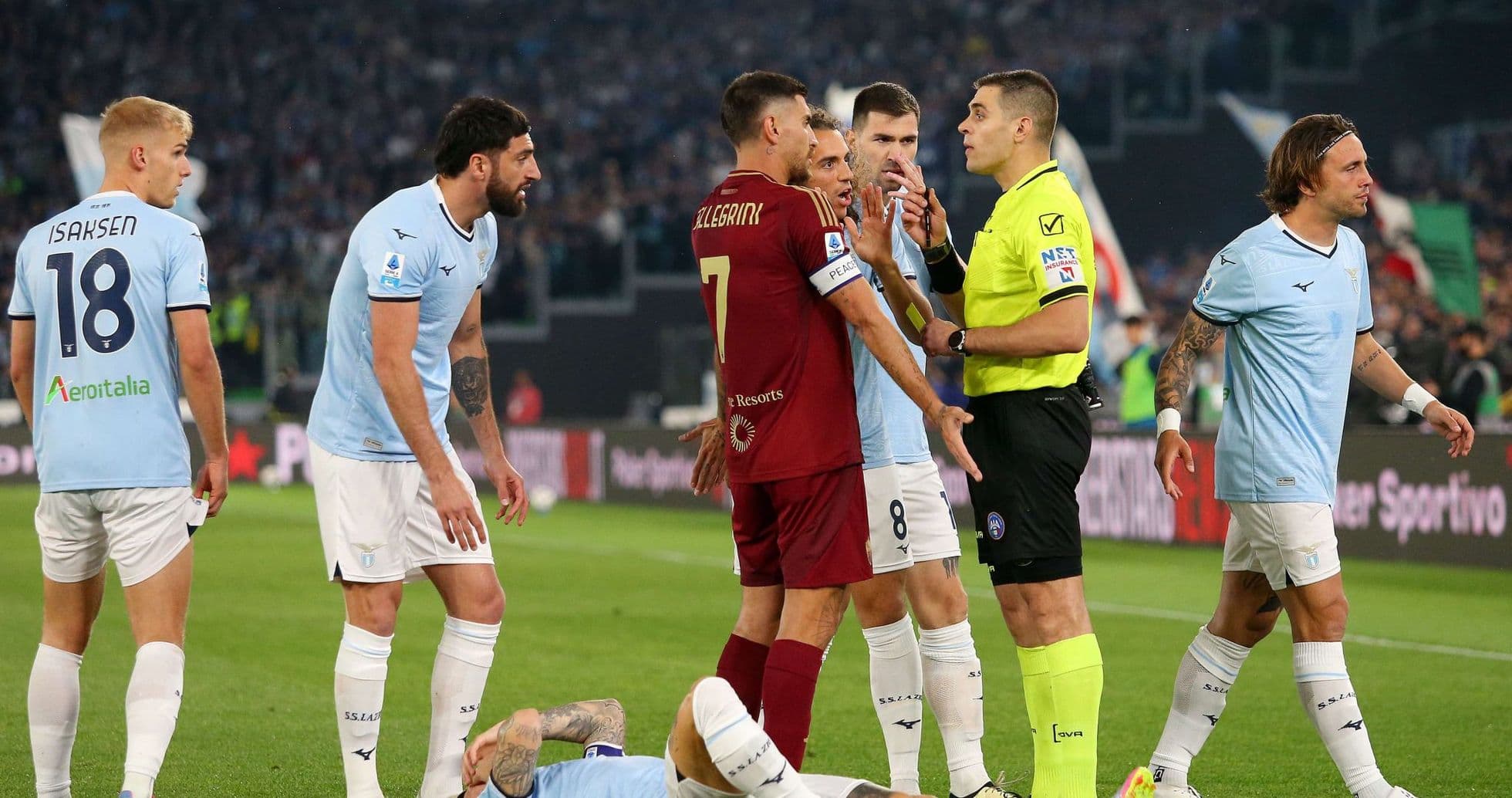 Players arguing with referee during AS Roma vs Lazio