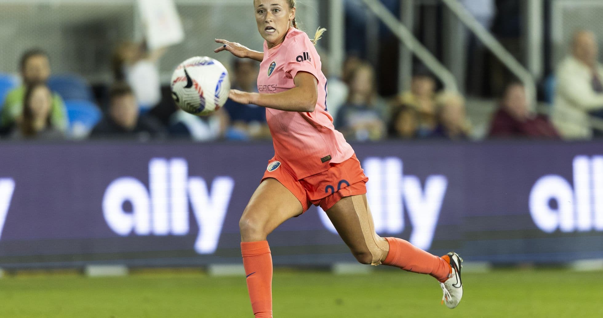 Player dribbling ball during NWSL match