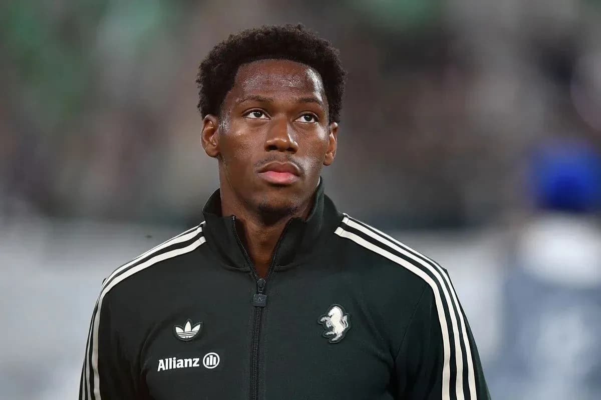 Player in warm-up jacket during match preparation