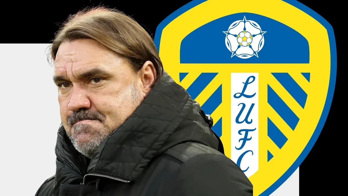 Coach in front of Leeds United logo