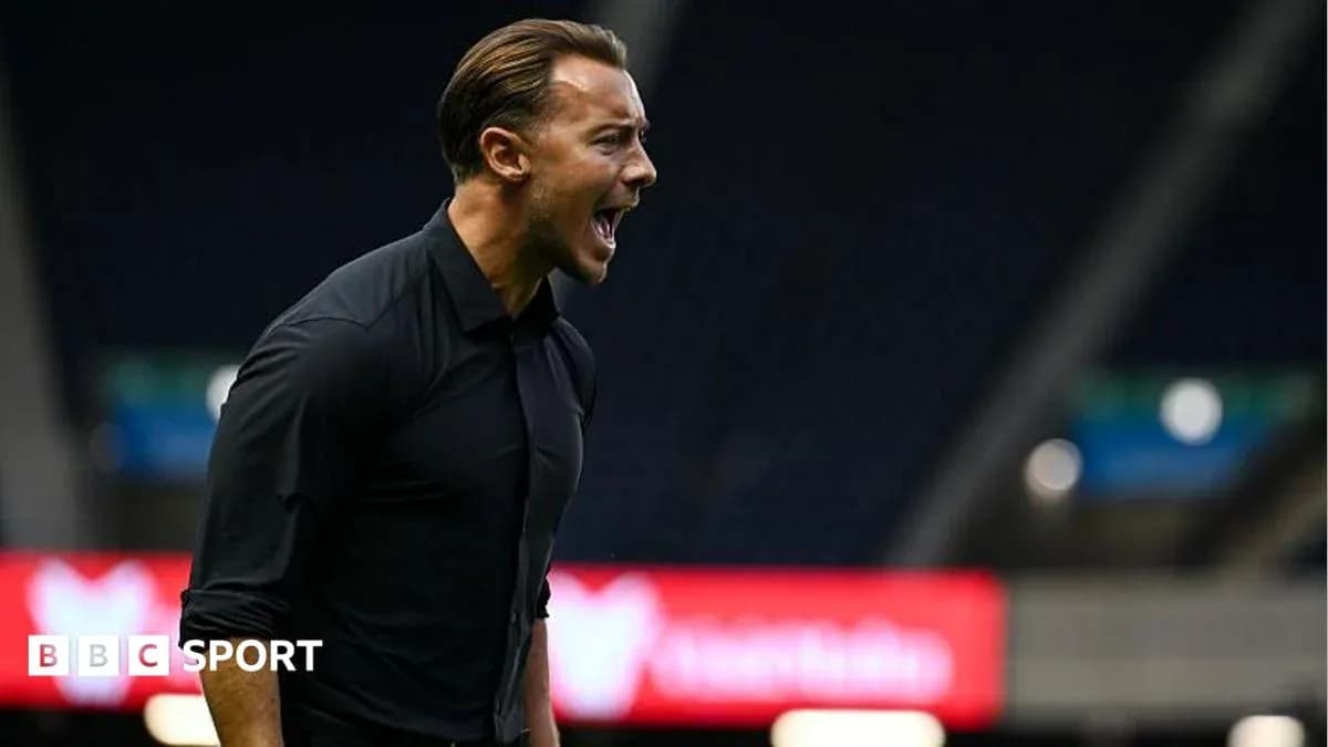 Coach shouting instructions on the sidelines