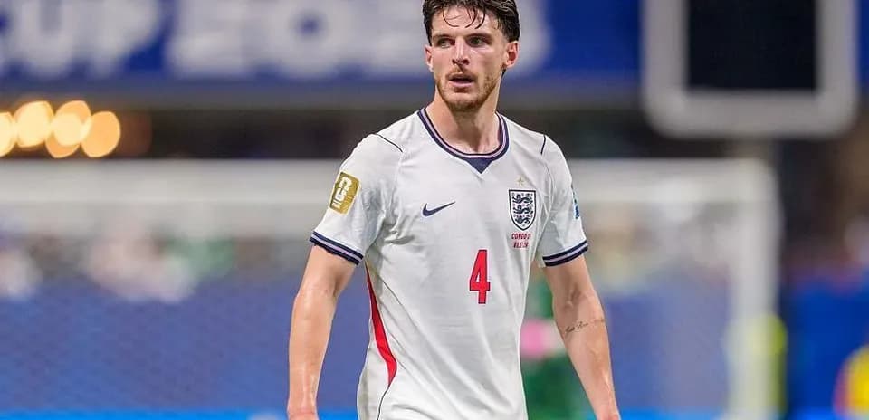 Player in England kit during match on field