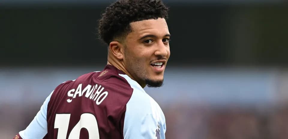 Player in Aston Villa jersey looking back