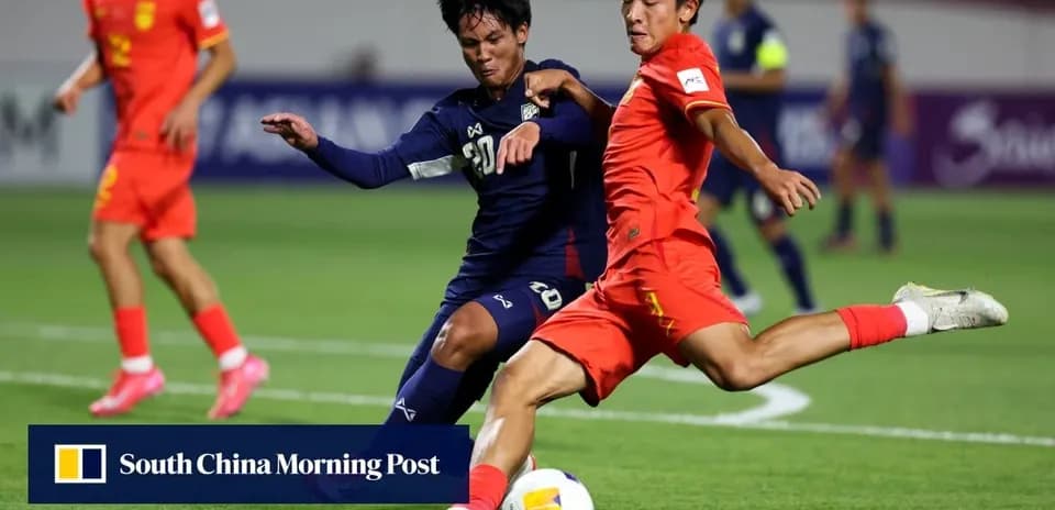 Players tackling each other during a football match