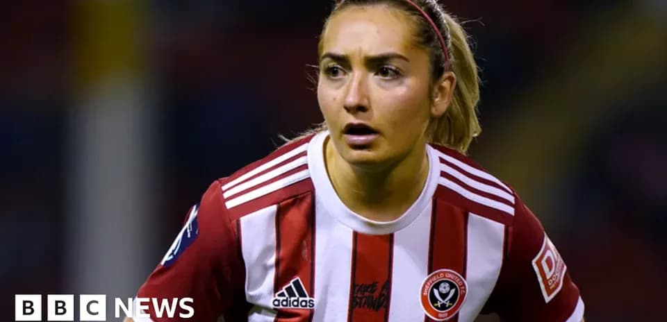 Player in red and white kit during match