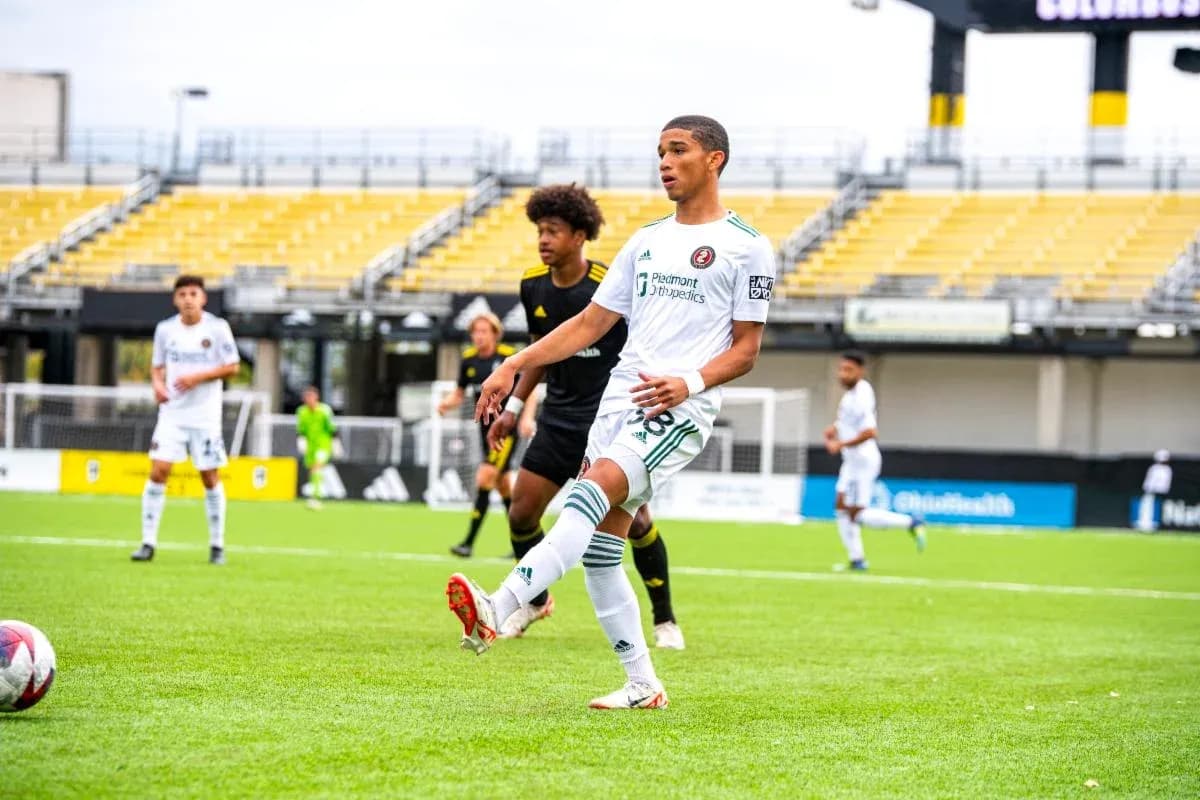 Columbus Crew II player kicking the ball