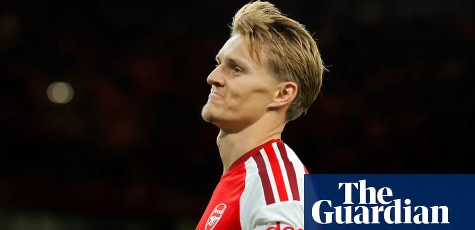 Arsenal player looking thoughtful during match
