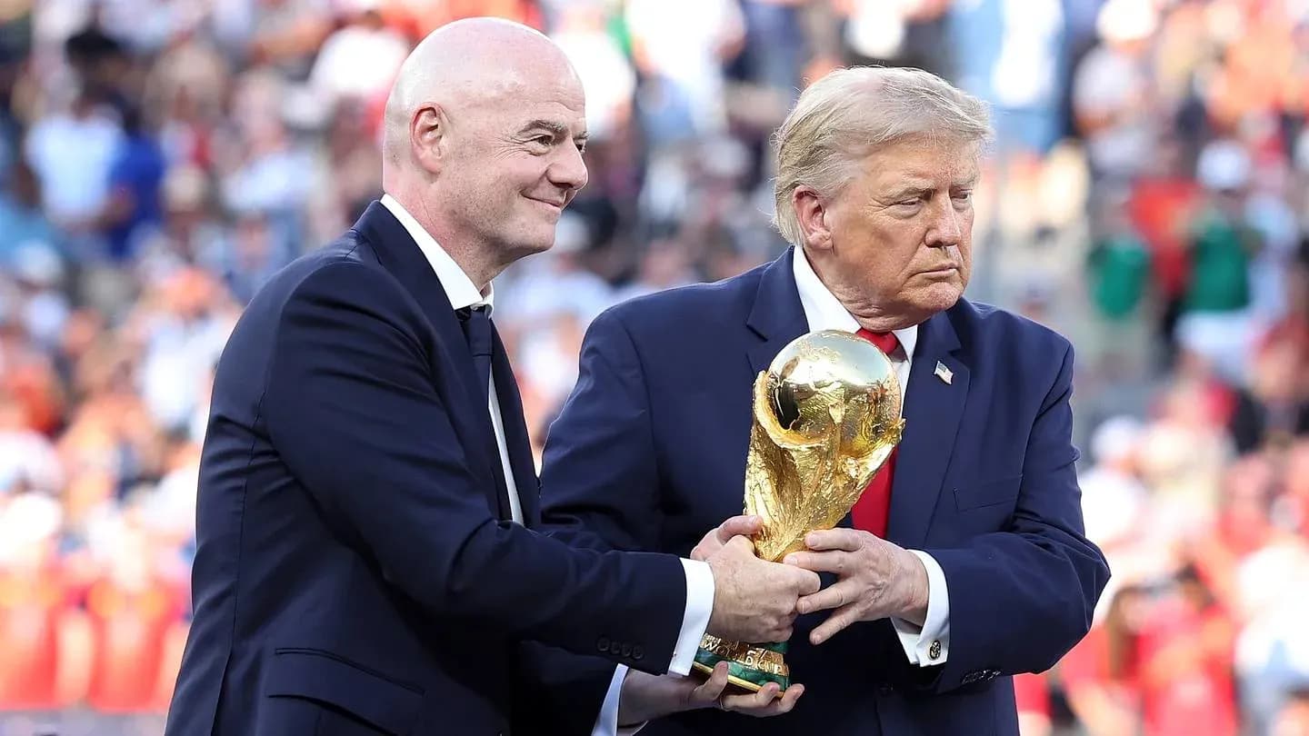 Gianni Infantino handing World Cup trophy to Donald Trump