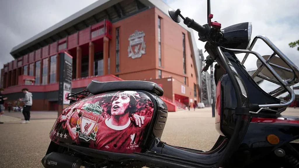Scooter with Liverpool FC artwork outside stadium