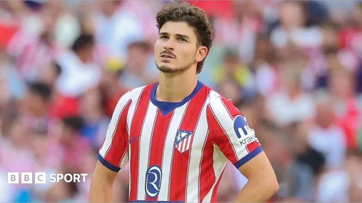 Player in Atlético Madrid kit during match