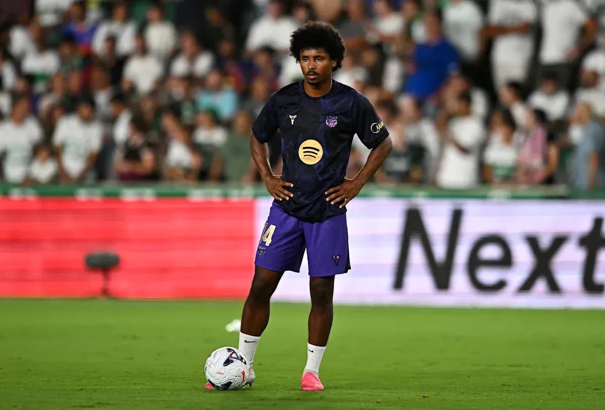 Player preparing for a free kick during match